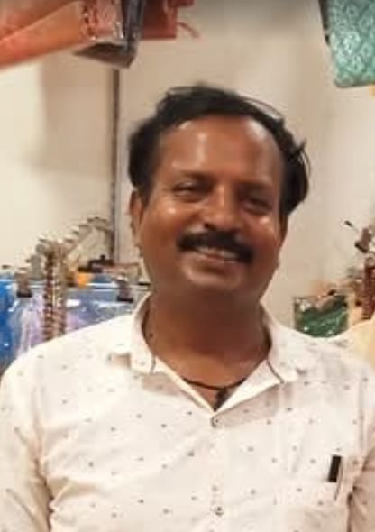 Santosh Kumar, local Varanasi tour guide, smiling